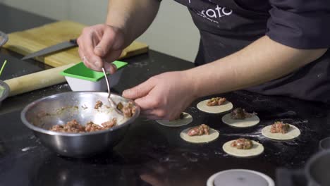 chef making dumplings