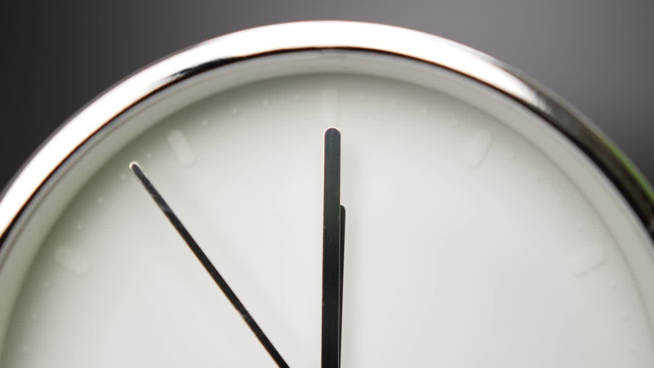 Silver Alarm clock Tell me the noontime.