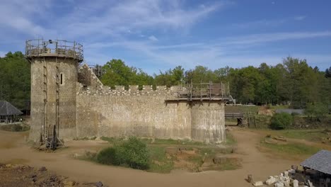 aerial view of the construction site of the medieval castle guedelon, france