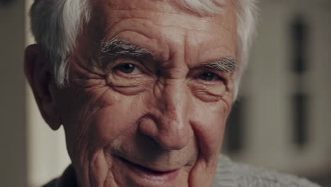 close-up portrait of a smiling elderly man