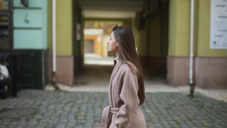 woman walking in an autumn city