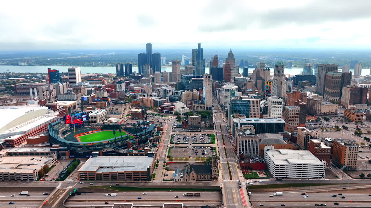 Detroit, USA, 28 July 2025: Detroit Skyline with Stadiums and Freeway Overcast View. A wide, overcast view captures the Detroit skyline