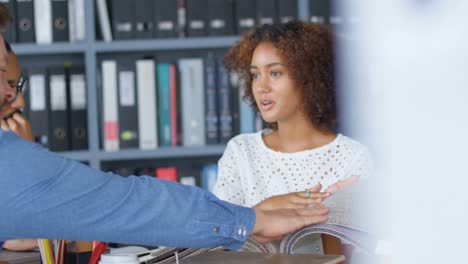 Business-colleagues-interacting-with-each-other-in-meeting-4k