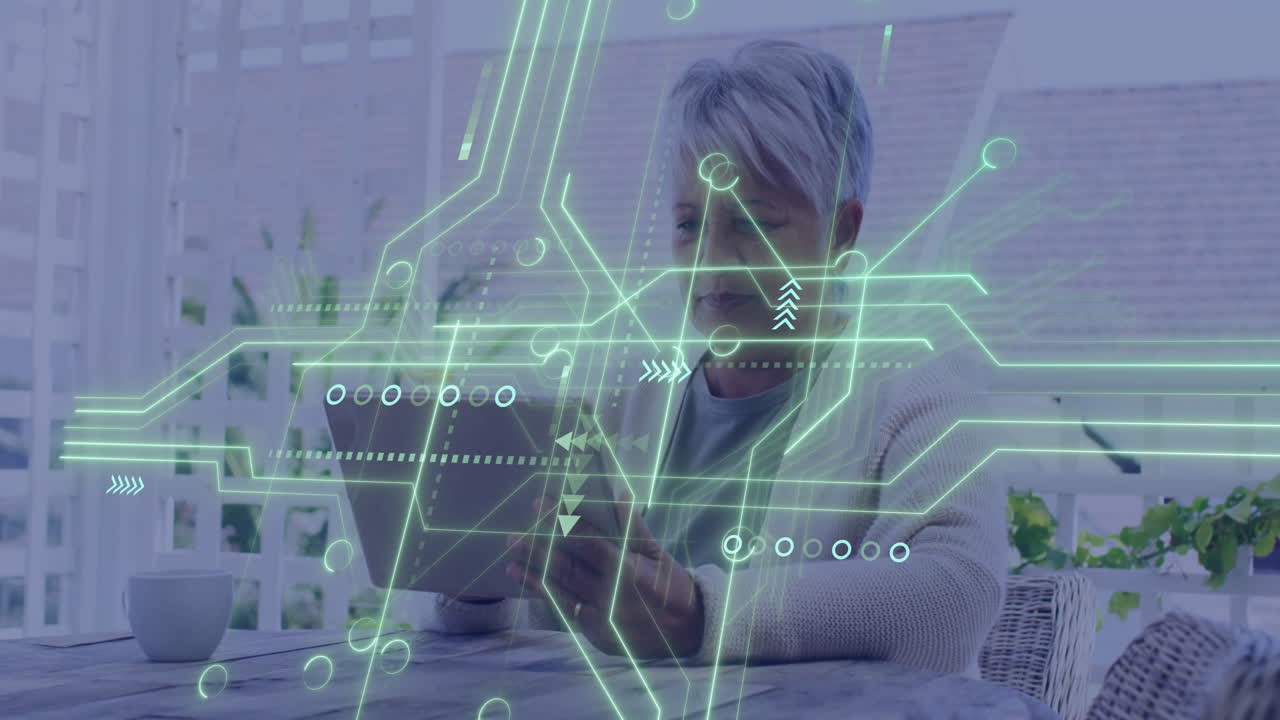 Animation of loading circles, arrows, circuit board pattern, biracial female researcher using tablet