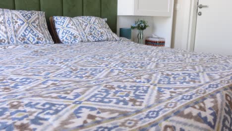 bedroom with a printed bedspread