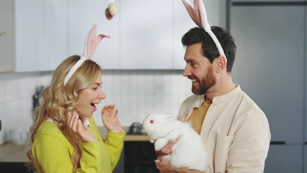 Couple with Easter Bunny in Kitchen