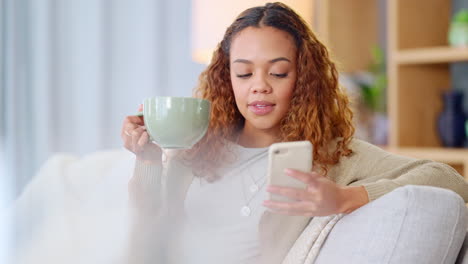 woman sitting while drinking coffee