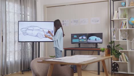 car design process in a modern workspace