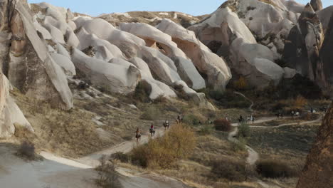 tourists experienced horseback riding tour in cappadocia, turkey