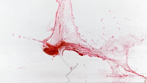 Breaking-the-glass-of-red-wine-in-slow-motion-on-white-background.-Shot-on-super-slow-motion-camera-1000-fps.