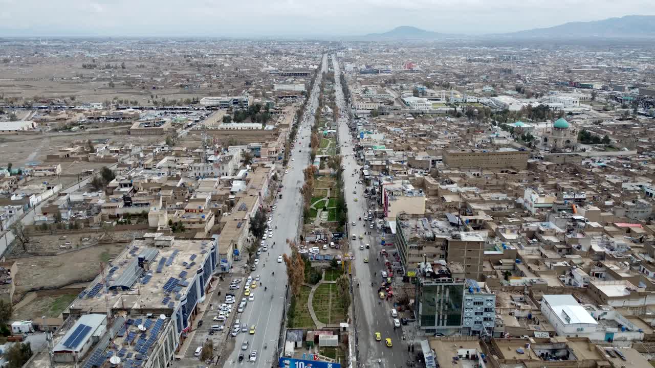 Jalalabad Drone Aerial of city center, Nangarhar, Afghanistan. View of City Street Traffic and Downtown Buildings