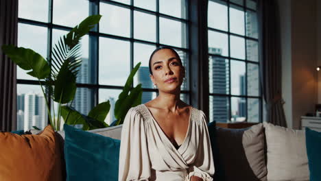 confident woman in modern apartment