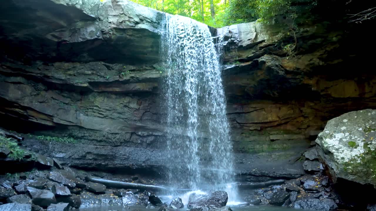 Beautiful Cucumber Falls in Ohiopyle State Park, PA - scenic waterfall view on a sunny day in one of Pennsylvania’s top outdoor destinations