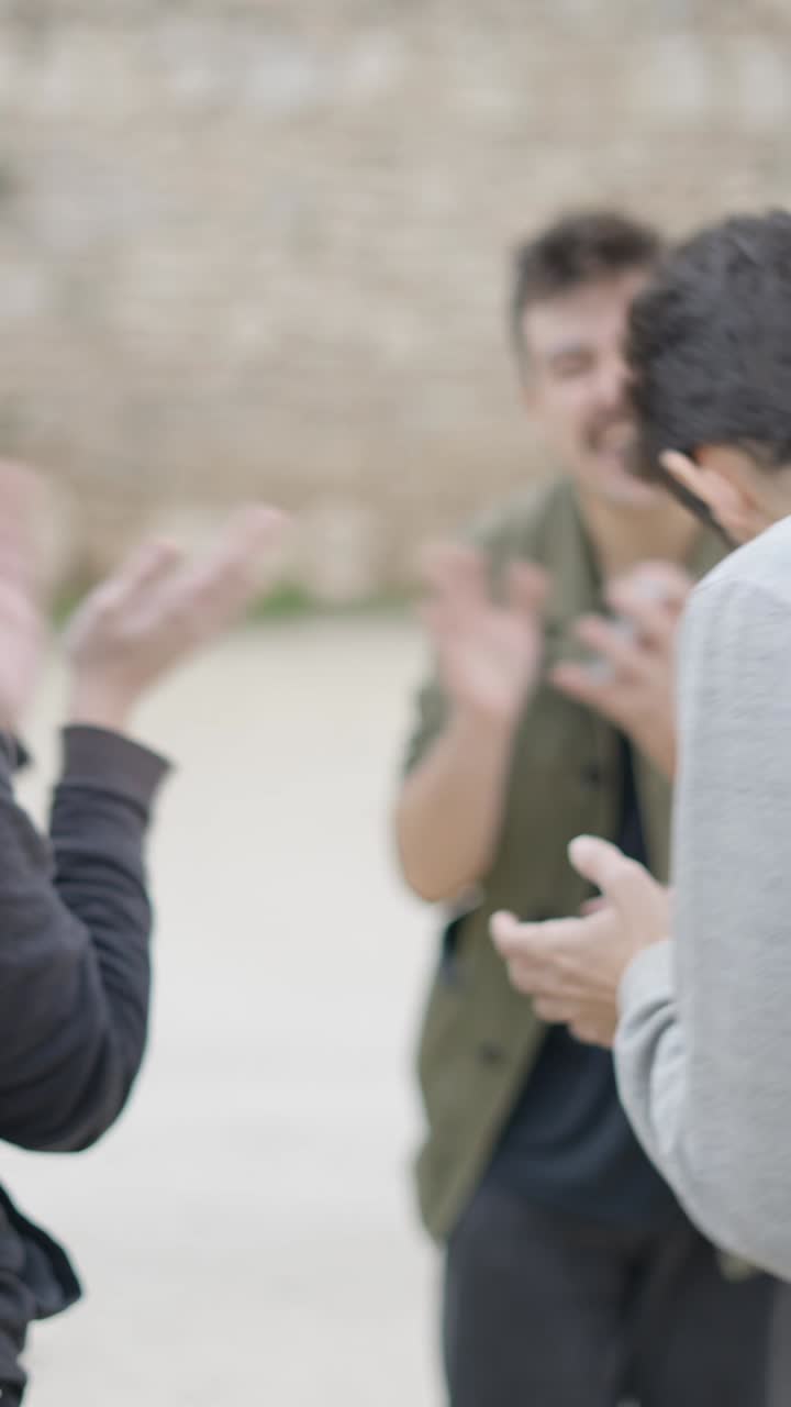 Joyful Card Trick Performance with Friends