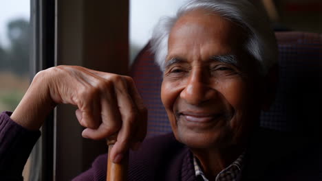 happy elderly man smiling on a journey