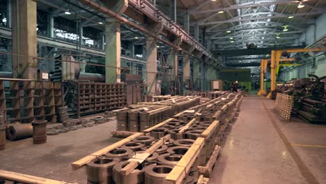 finished tubular round metal products at metallurgical plant in workshop, metal production and metalworking