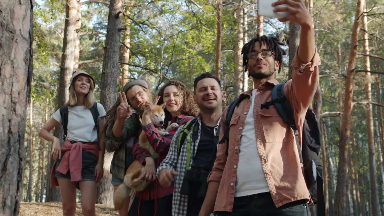 Friends Taking a Selfie in a Forest