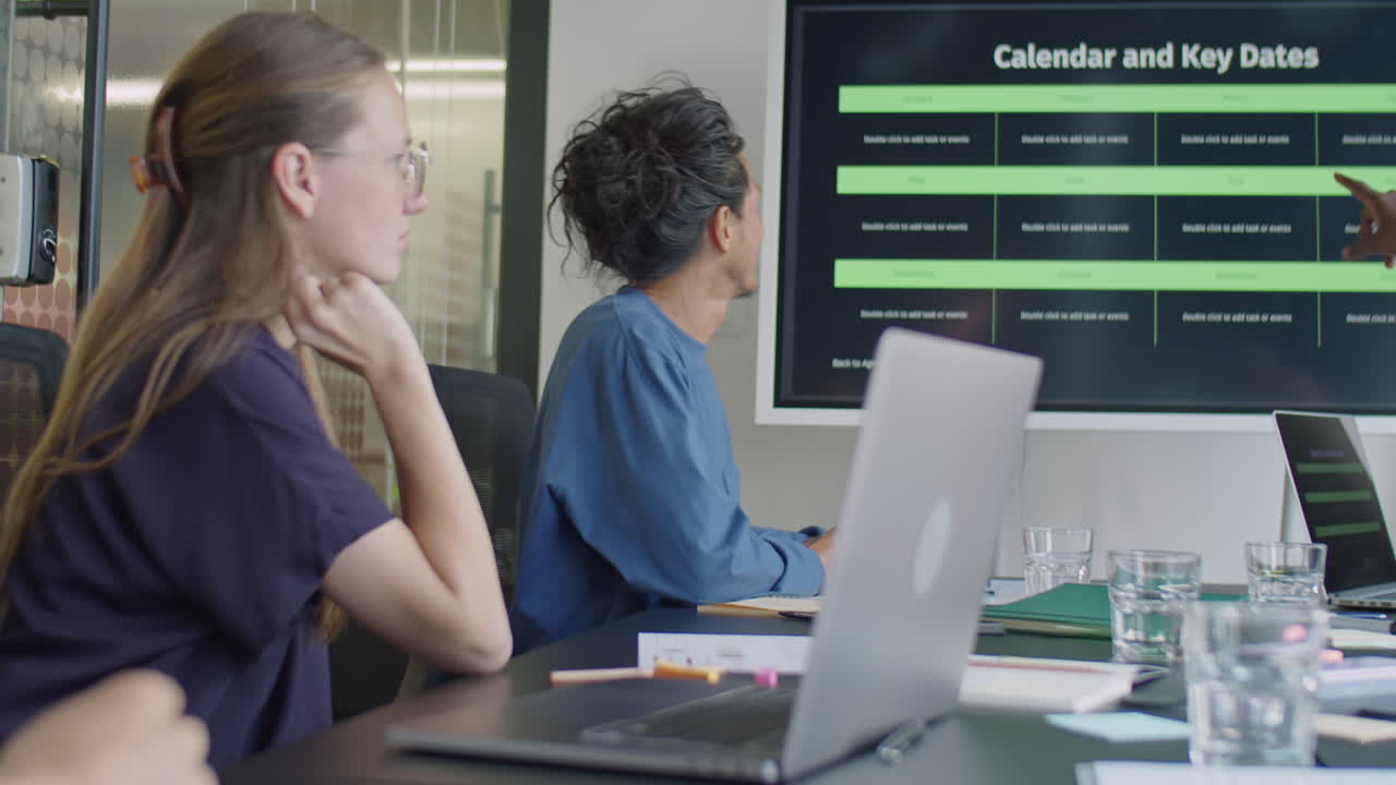Multi-Ethnic Business Team Discussing Plans on Office Meeting