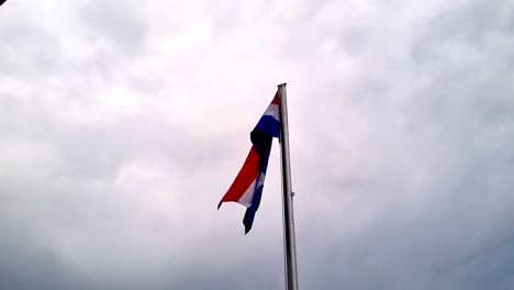High-Rise-Croatian-Flag-Waving-In-Wind-On-Island-Of-Brac,-Croatia