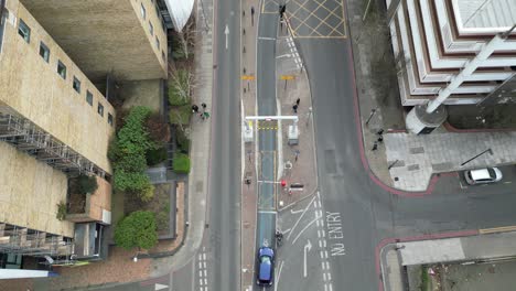 Aerial-Overhead-overhead-birds-eye-view-Rotherhithe-Tunnel-entrance-closed-cars-queuing-London-UK