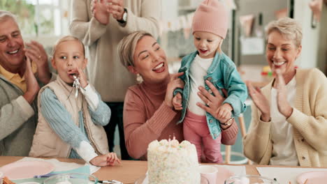 birthday party, excited and a child blow candles