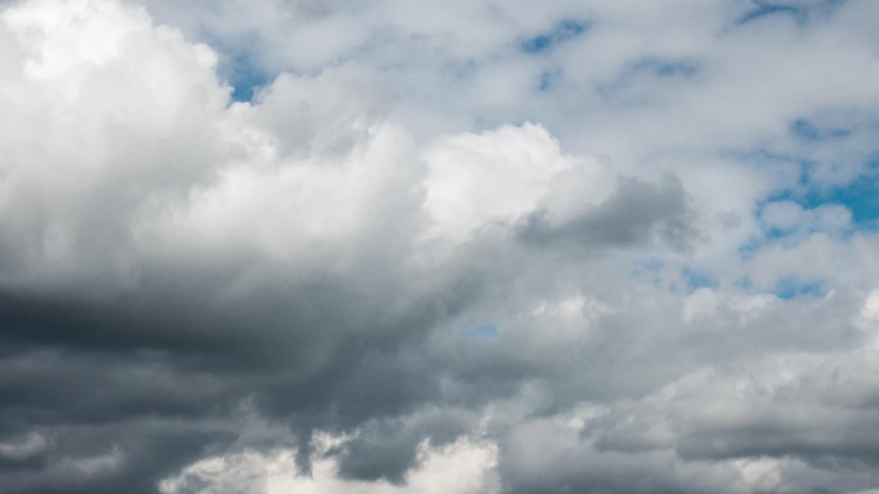 White Clouds Moving On The Blue Light Sky
