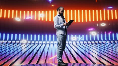 cool person standing beneath glowing neon lights surrounded by vibrant colors