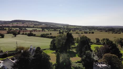 aerial above buckerell village showing idyllic east devon countryside