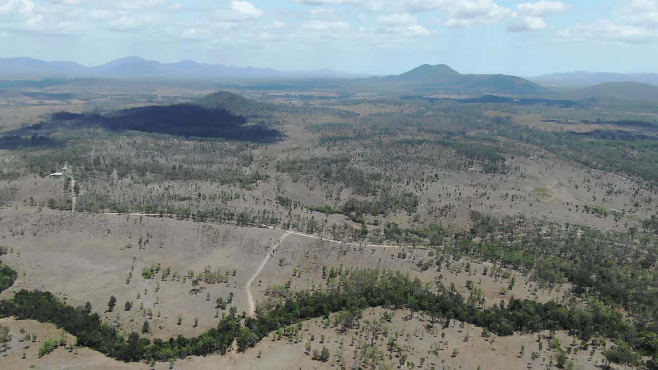 Wide panoramic aerial drone view over Queensland landscape in Australia. Sideways pov