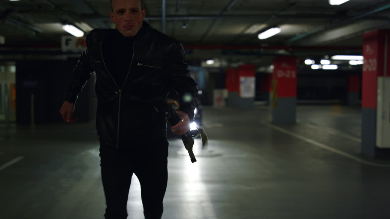 Criminal running from police car. Police in patrol vehicle following suspect