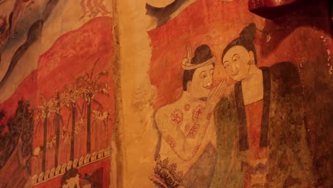 famous and historic art wall painting of puumanyaaman in wat phumin, nan province, thailand