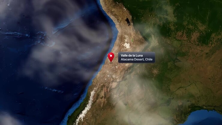 Earth orbit zooms down to a map marker pinpointing Valle de la Luna, Chile. Includes NASA public domain imagery.