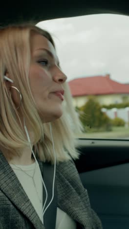 woman listening to music while driving