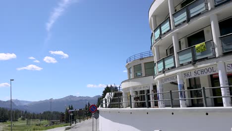 building with mountains in the background