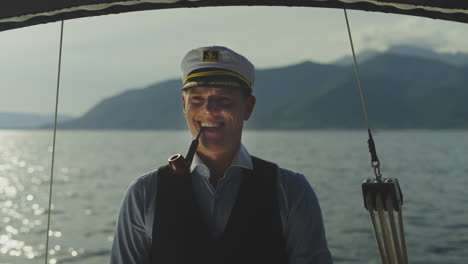 smiling captain on a boat