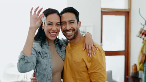 Love,-keys-and-smile-with-couple-in-new-house