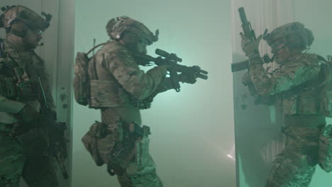 soldiers opening doors of room and entering a ruined building