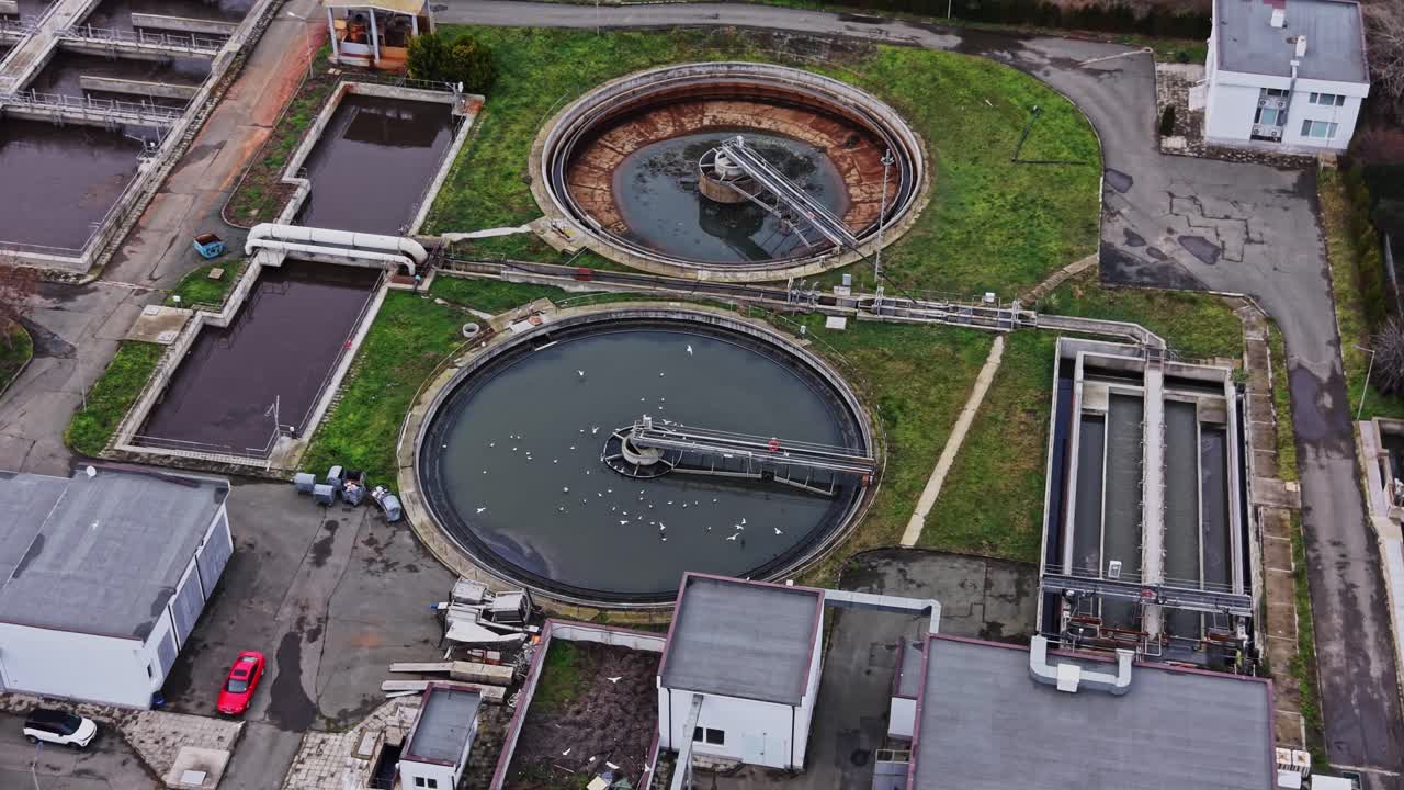 Water purification plant shows process of cleaning water in large tanks