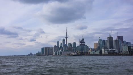 medium shot timelapse of the toronto skyline from across the bay at polson pier