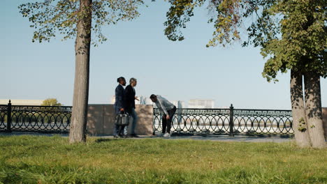 people enjoying the park and city