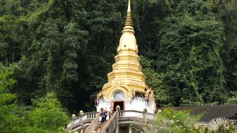 golden temple pagoda in the jungle wat tham pha plong, chiang dao, thailand