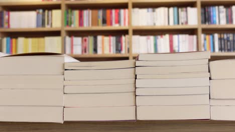 stacks of books in a library