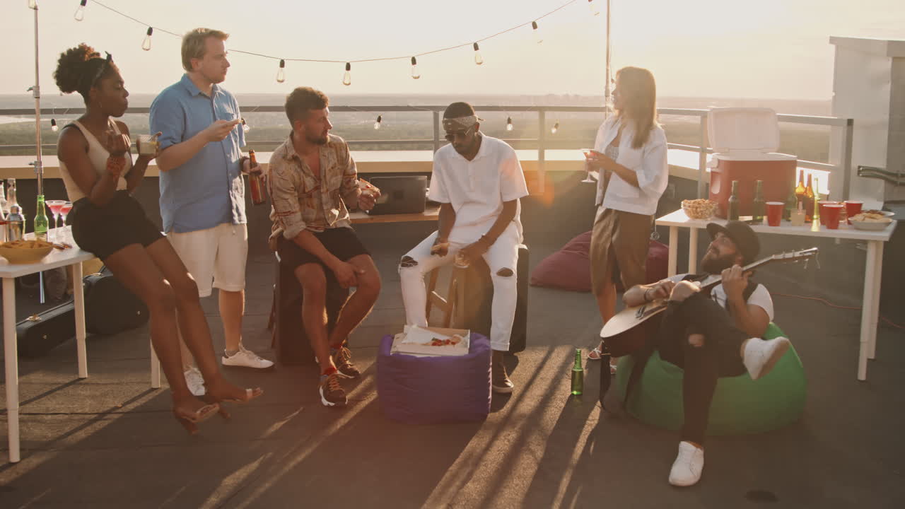 Young People Hanging Out on Rooftop Terrace