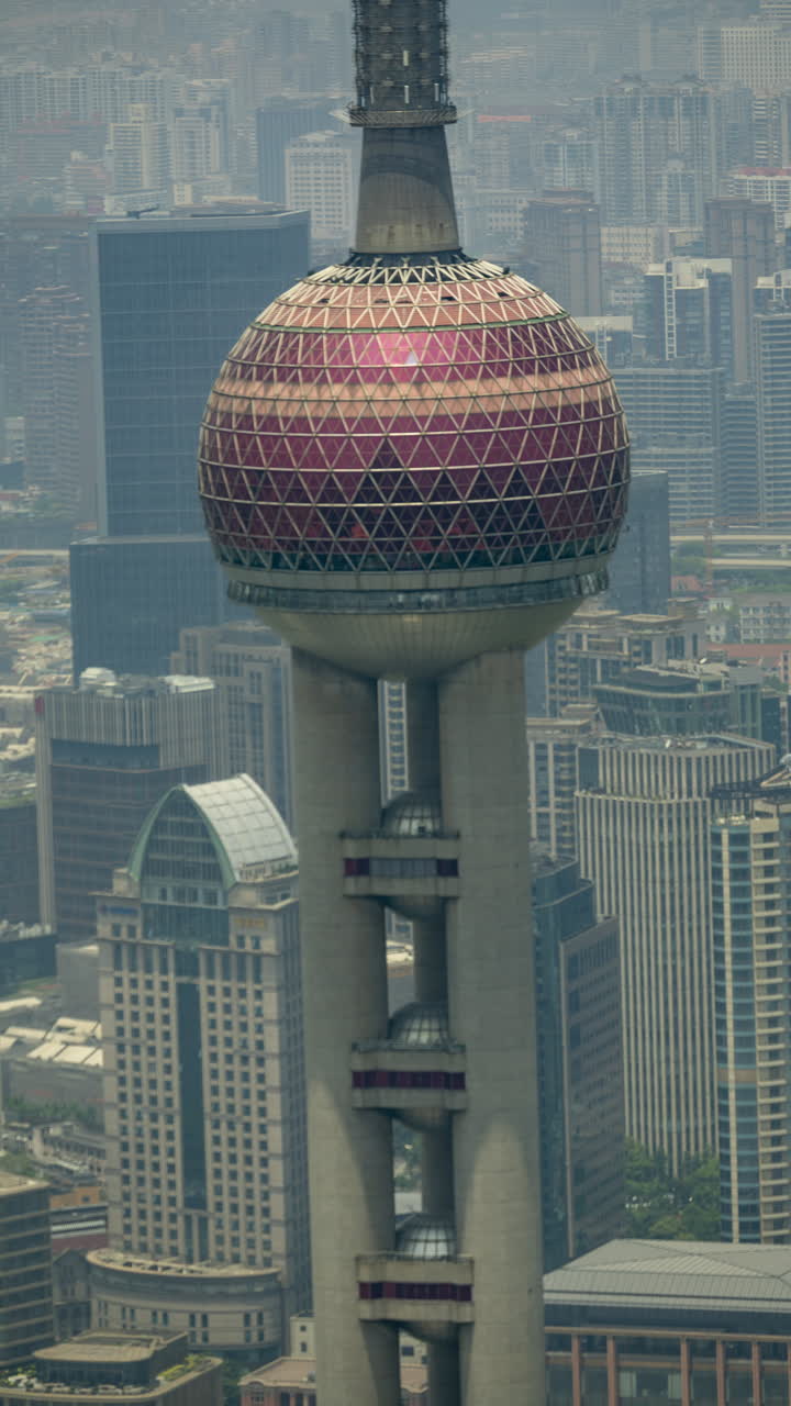 SHANGHAI, CHINA - 18 MAY 2025 : Timelapse of the Shanghai city skyline from a high vantage point in vertical
