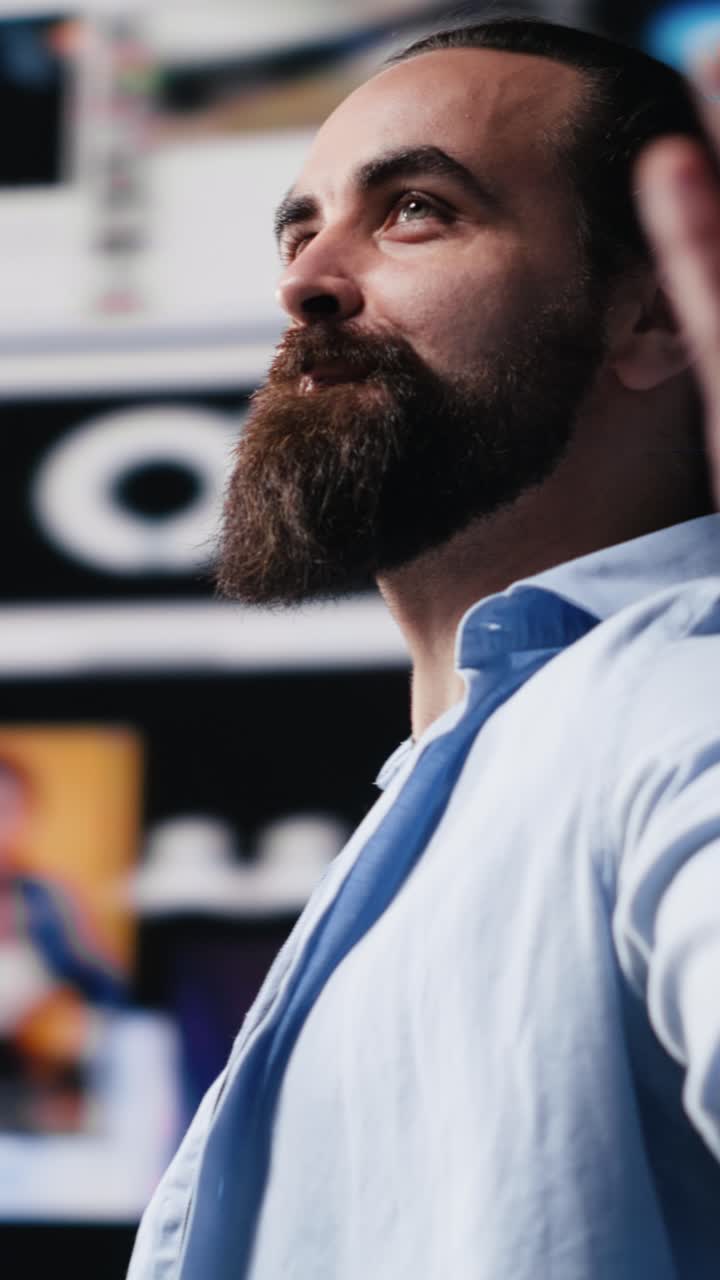 Vertical Video Young guy with ambition connecting on a social network in the digital world