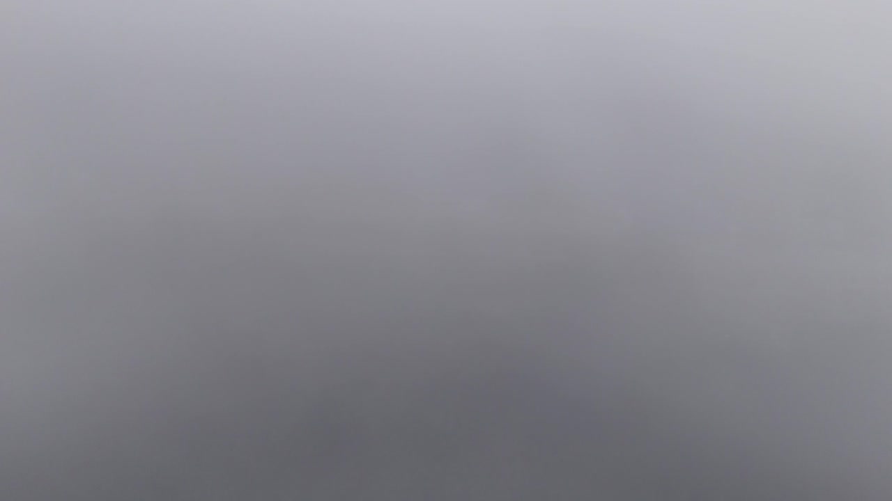 While operating a drone, the operator managed to capture a picturesque scene of a charming town nestled amidst misty mountains in Baguio, Philippines.