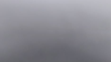 while operating a drone, the operator managed to capture a picturesque scene of a charming town nestled amidst misty mountains in baguio, philippines.