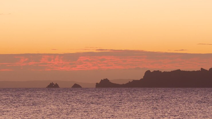Porquerolles rocky silhouette with sunrise France view from Tour Fondue