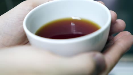 freshly prepared green tea in a teapot