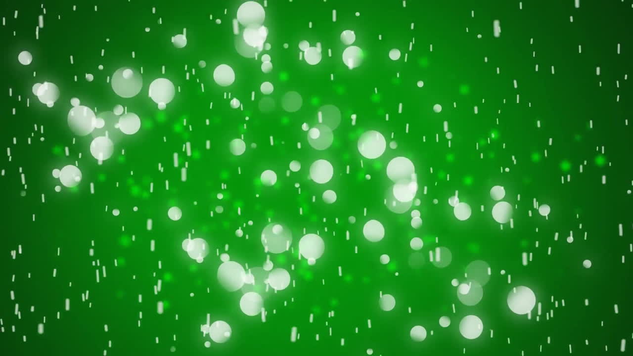 Animation of white spots moving on green background